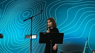 Elizabeth singing at the talent show