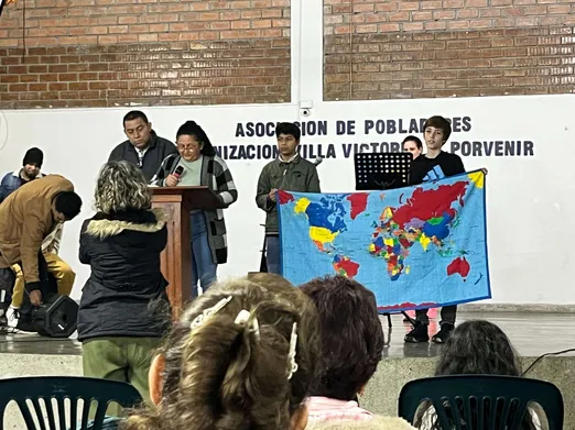 Joshua helping with missions time at the church