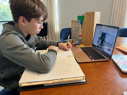 Joshua doing his schoolwork