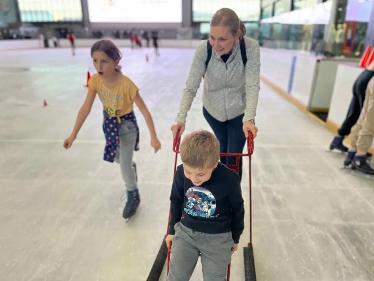 Ice skating together as a family